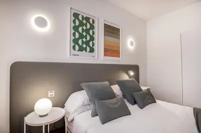 Cama o camas de una habitación en Agaete Shine Suites