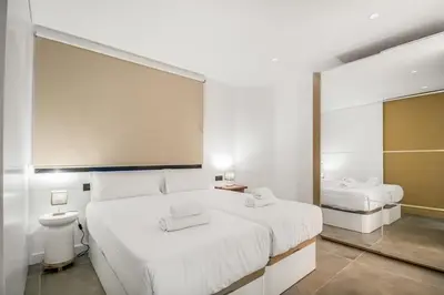Cama o camas de una habitación en Las Palmas Beach House Retreat