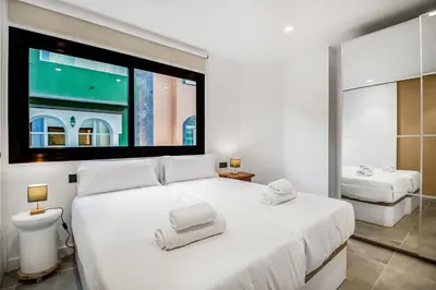 Cama o camas de una habitación en Las Palmas Beach House Retreat