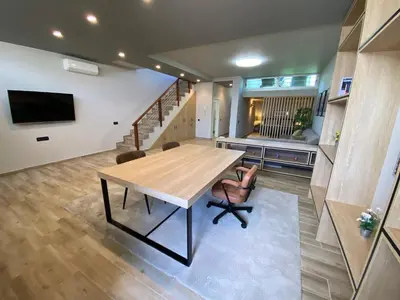 Una televisión o centro de entretenimiento en Casa Mia