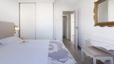 Cama o camas de una habitación en Bungalows Adonis