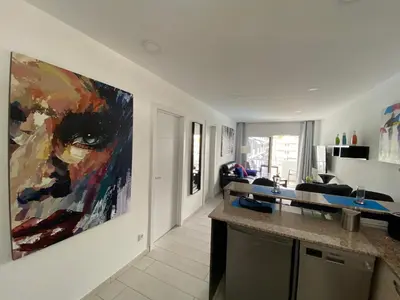 Una televisión o centro de entretenimiento en Los Volcanes Luxus Apartment