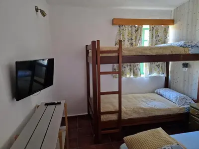 Cama o camas de una habitación en Hotel Rural Juncalillo