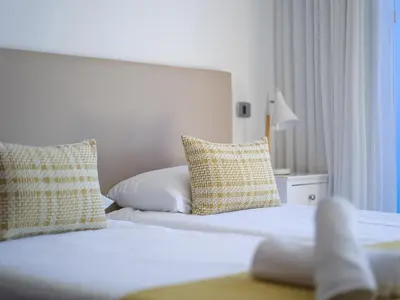 Cama o camas de una habitación en HolaMogamar