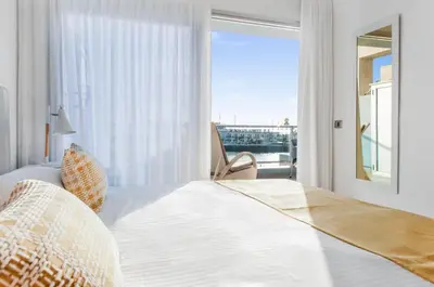 Cama o camas de una habitación en HolaMogamar