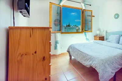 Cama o camas de una habitación en Bungalow Betancuria 16 by Homestaygrancanaria