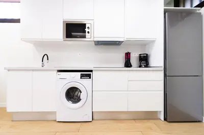 Una cocina o zona de cocina en M&M SUITE LOS CACTUS by HOMESTAYGRANCANARIA