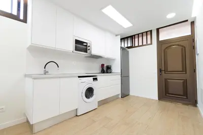 Una cocina o zona de cocina en M&M SUITE LOS CACTUS by HOMESTAYGRANCANARIA