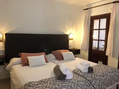 Cama o camas de una habitación en Altamar Beachfront
