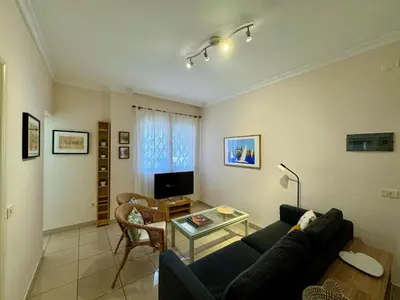 Una televisión o centro de entretenimiento en Mesa y Lopez Home