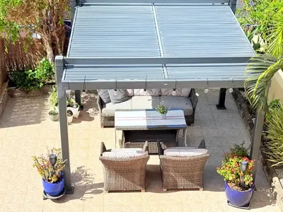 Un patio o zona al aire libre en Cozy Corner Close to Beach, Golf and Shopping
