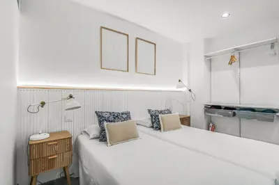 Cama o camas de una habitación en Beachside Comfort Las Canteras
