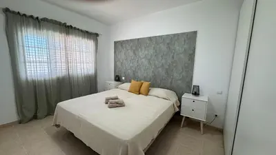 Cama o camas de una habitación en Villa Dunas del Paraiso