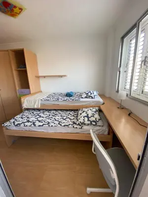 Cama o camas de una habitación en EstrellaMar