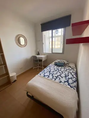 Cama o camas de una habitación en EstrellaMar