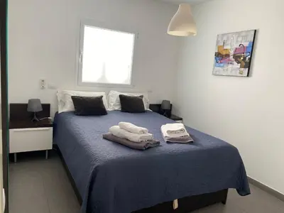 Cama o camas de una habitación en Nectarina Bungalow Maspalomas