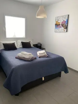 Cama o camas de una habitación en Nectarina Bungalow Maspalomas