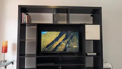 Una televisión o centro de entretenimiento en Playa del Cura - Mar Paraiso