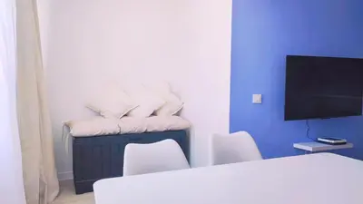 Una televisión o centro de entretenimiento en Beni's Maspalomas