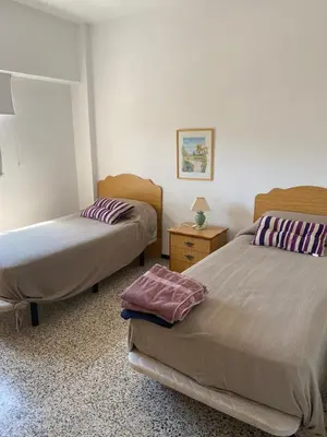 Cama o camas de una habitación en Comfortable and conveniently located house