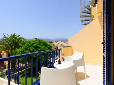 Un balcón o terraza de Duplex in Meloneras near Maspalomas Beach