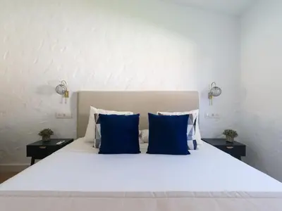 Cama o camas de una habitación en Bungalow near Yumbo & Playa del Inglés Beach