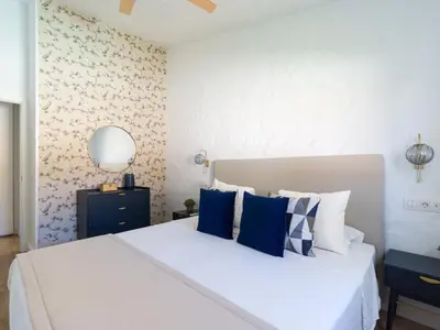 Cama o camas de una habitación en Bungalow near Yumbo & Playa del Inglés Beach