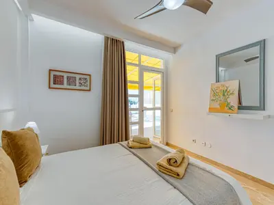 Cama o camas de una habitación en Apartment in Playa de Mogán by the Beach