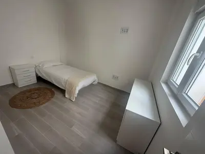 Cama o camas de una habitación en Casa Ocin Telde