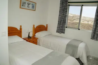 Cama o camas de una habitación en Hacienda Adejo
