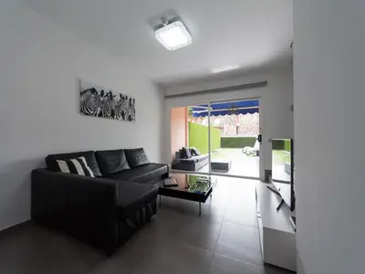Zona de estar de Duplex in Maspalomas near Meloneras Beach