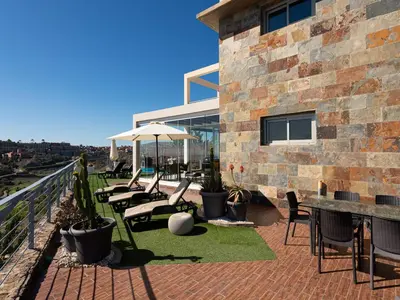 Un balcón o terraza de Villa in San Bartolomé with Private Heated Pool