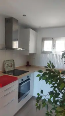 Una cocina o zona de cocina en Cayey 2-bedroom Beach Apartment