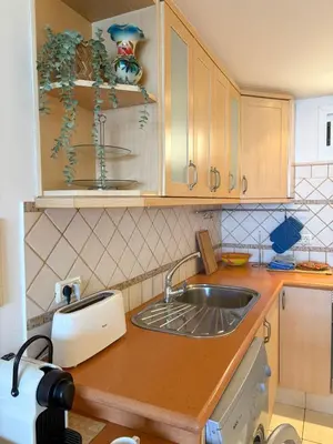 Una cocina o zona de cocina en Alegre Beach Home - Sunset Apartment