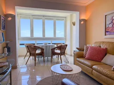 Zona de estar de Alegre Beach Home - Sunset Apartment
