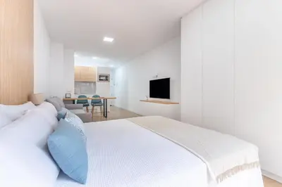 Cama o camas de una habitación en Home2Book Modern Studio in Las Palmas