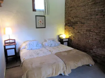 Cama o camas de una habitación en Casa rural El Alpendre
