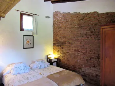 Cama o camas de una habitación en Casa rural El Alpendre