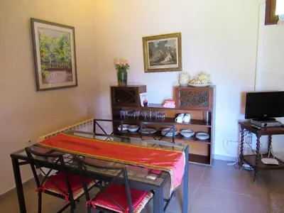 Una televisión o centro de entretenimiento en Casa rural El Alpendre
