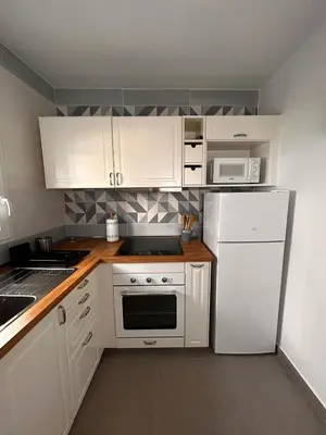 Una cocina o zona de cocina en Balcón Néstor Álamo II
