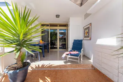 Zona de estar de Tamaran Garden View Apartment