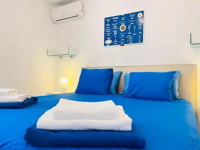 Cama o camas de una habitación en Villa Nautica Puerto Rico by Alquiler de Súeño