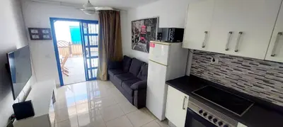 Una cocina o zona de cocina en Maspalomas J&O