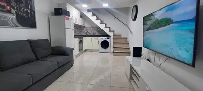 Una televisión o centro de entretenimiento en Maspalomas J&O