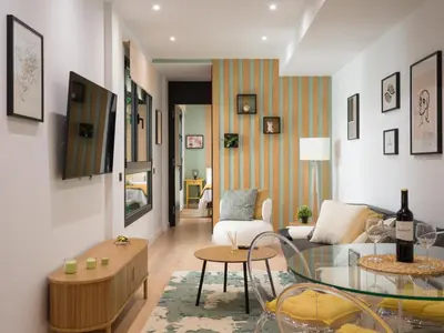 Una televisión o centro de entretenimiento en Moderno apartamento cerca playa Las Canteras D1D