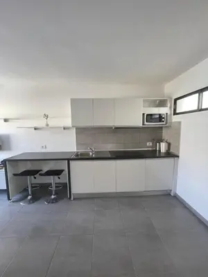Una cocina o zona de cocina en Kay Cumana II