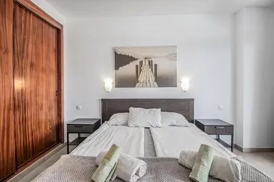 Cama o camas de una habitación en Aguila Playa Beach Escape