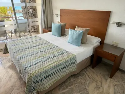 Cama o camas de una habitación en Anfi del mar - 4 people separate bedroom