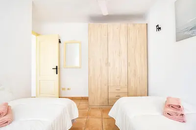 Cama o camas de una habitación en Las Olas Apartments