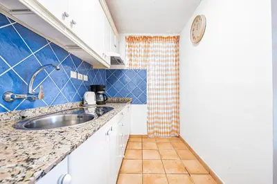 Una cocina o zona de cocina en Las Olas Apartments